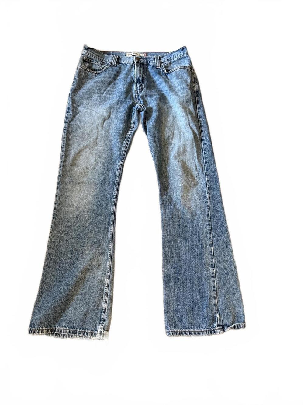 Vintage Levi’s 527 Low Boot Cut Jeans Light Wash Distressed Hem Men’s W34